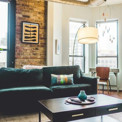 pexels photo 1918291 1918291 Contemporary living room with elegant decor and cozy furniture in urban setting.